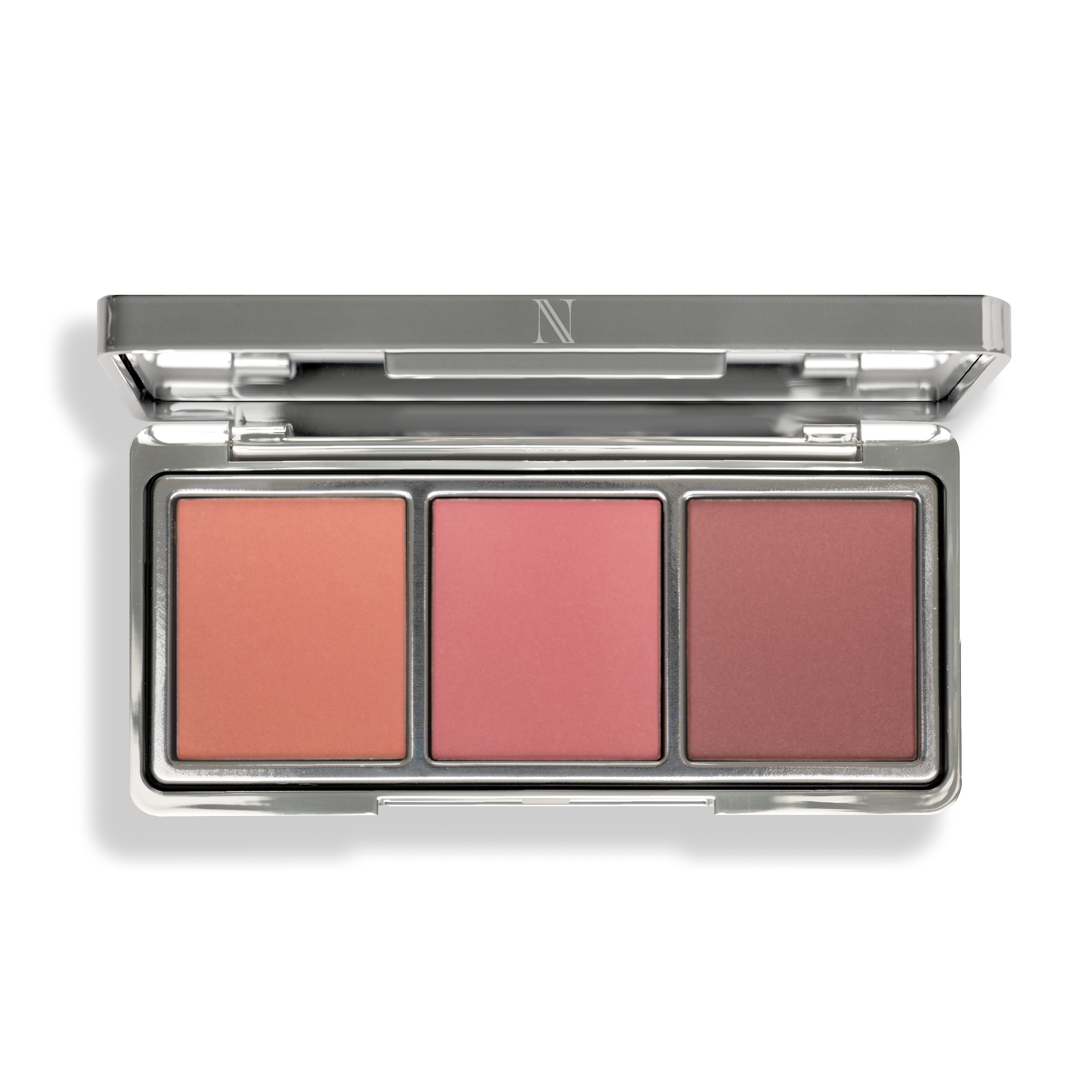 Explore the In Full Bloom Blush Palette from Shopgalaxys, featuring peach, pink, and mauve blushes in a silver compact with a reflective lid. Made with natural ingredients for a luminous finish and stunning glow every time.