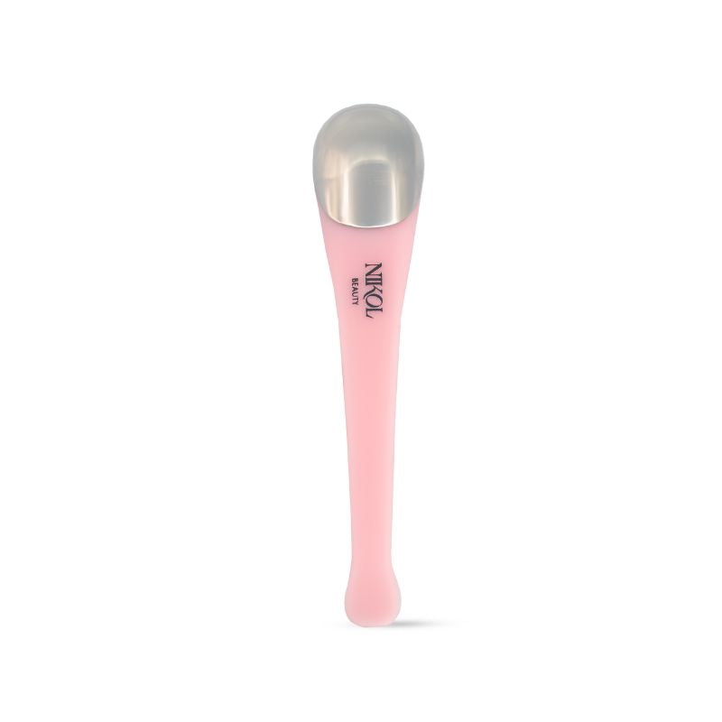 Discover the Shopgalaxys Cooling Eye Roller: a pink applicator with a metallic top, expertly designed to de-puff under-eyes. Its elongated, curved handle guarantees ease of use while the sleek design features Nikol, prominently displayed against a white background.
