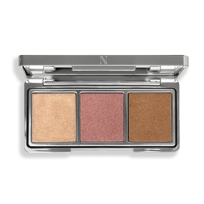 Introducing the Classic Beach Glow by Shopgalaxys, featuring three shimmery shades: gold, pink, and bronze. Housed in a sleek rectangular silver case with a hinged lid, each sits in its square compartment. This collection uses Hot-Pour Technology for a flawless highlight or eyeshadow look.