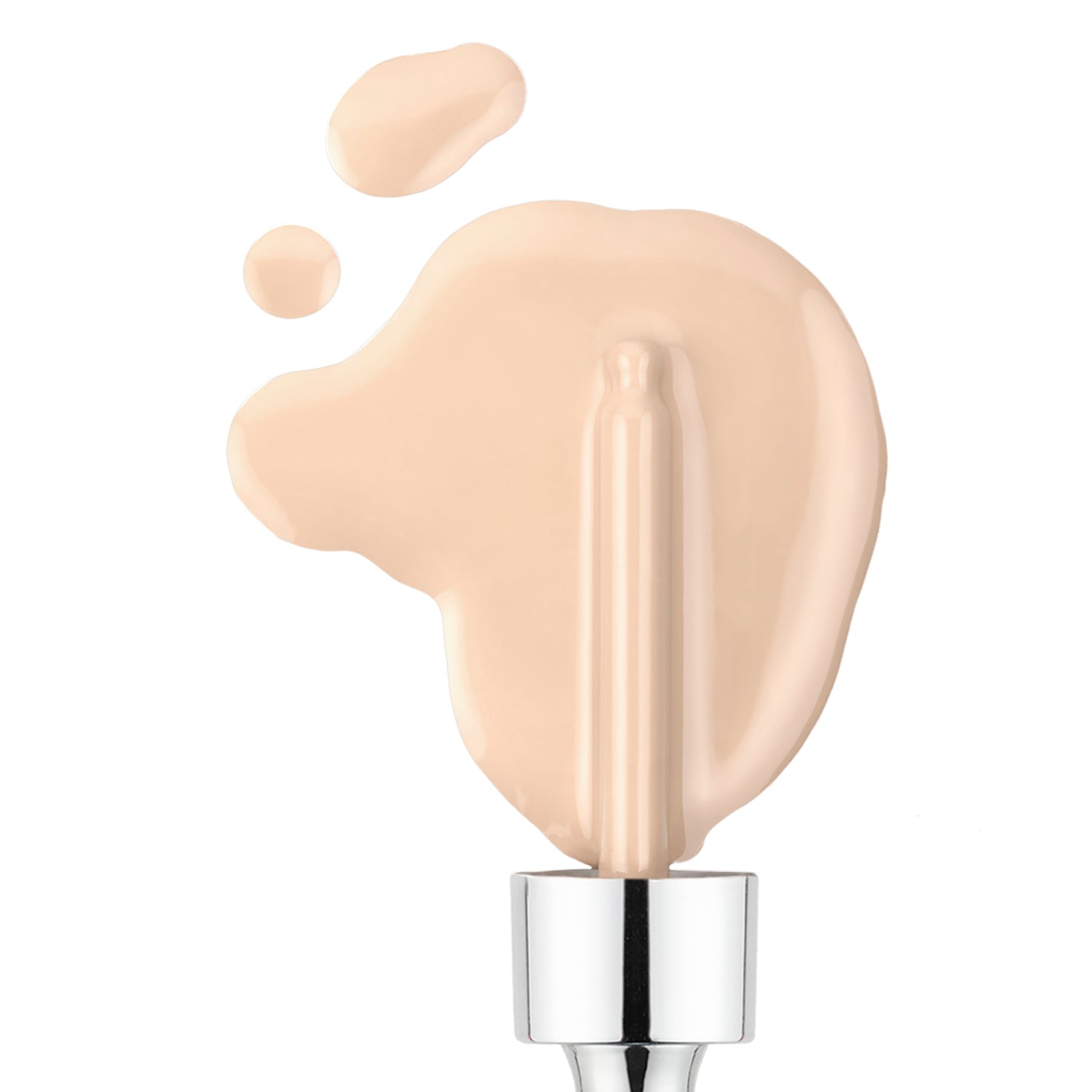 The Shopgalaxys Serum Foundation, with its smooth creamy texture and light beige shade, is spread next to drops using a silver applicator, offering customizable coverage for a flawless finish that aligns with clean beauty standards.
