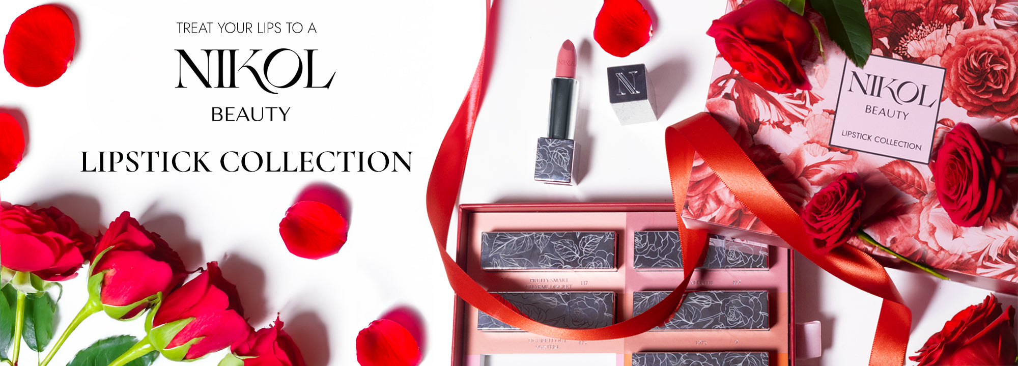 Open lipstick, rose petals, and a gift box of Shopgalaxys Lipstick Collection are displayed on a white background with a red ribbon and pink floral packaging. Text reads: Treat your lips to a Shopgalaxys Lipstick Collection.