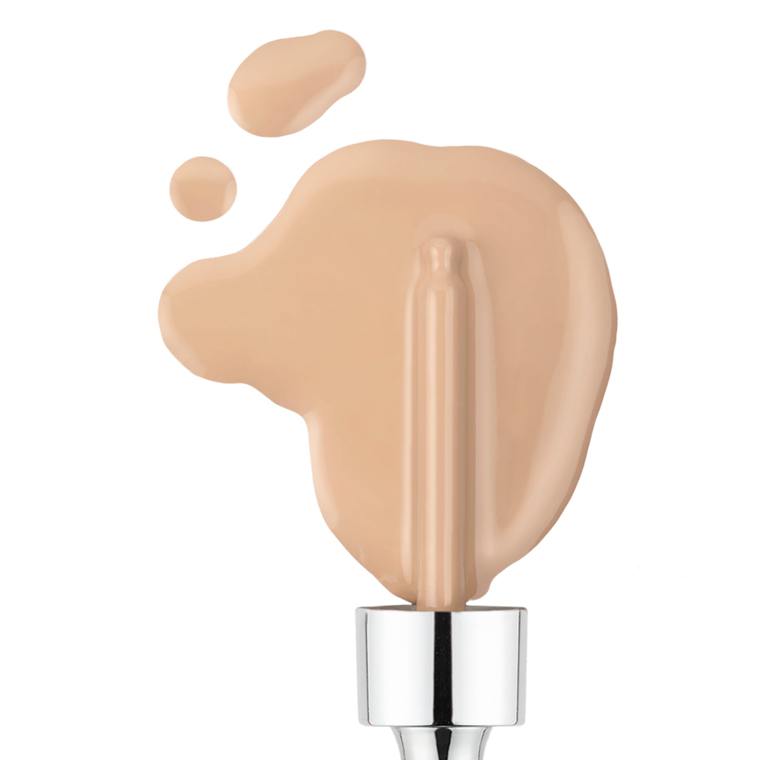 Beige liquid foundation pools on a white surface, with a silver-topped applicator across it. Discover Shopgalaxys Serum Foundations customizable coverage for a clean beauty experience that enhances your natural glow.