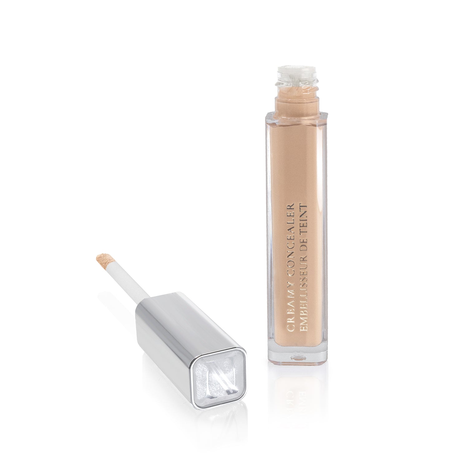 An open Creamy Concealer by Shopgalaxys, featuring a silver cap and doe-foot applicator, is displayed next to its upright container showcasing the high-coverage beige cosmetic product.