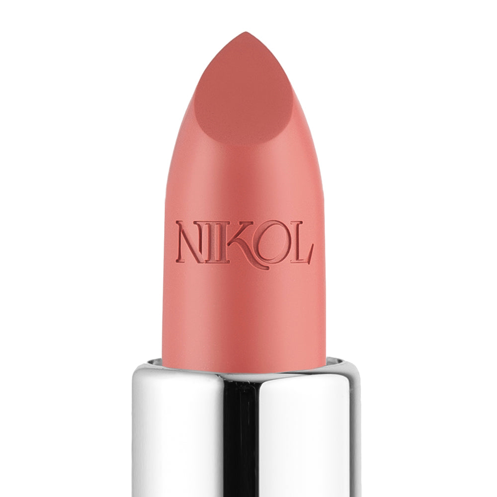 A close-up of NikRay Shiny Velvet Cream Lipstick #701 by Shopgalaxys features a light pink hue ideal for mature lips. Its hydrating formula with cruelty-free elegance is embossed on the tube, housed in shiny silver metallic casing against a plain white background.