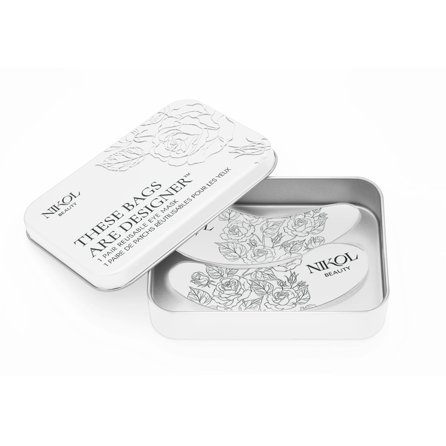 A metal tin labeled These Bags Are Designer-Eye Mask with rose designs contains white under-eye patches. Printed with Shopgalaxys, these luxurious eye masks elevate any skincare routine, delivering a refreshed look.