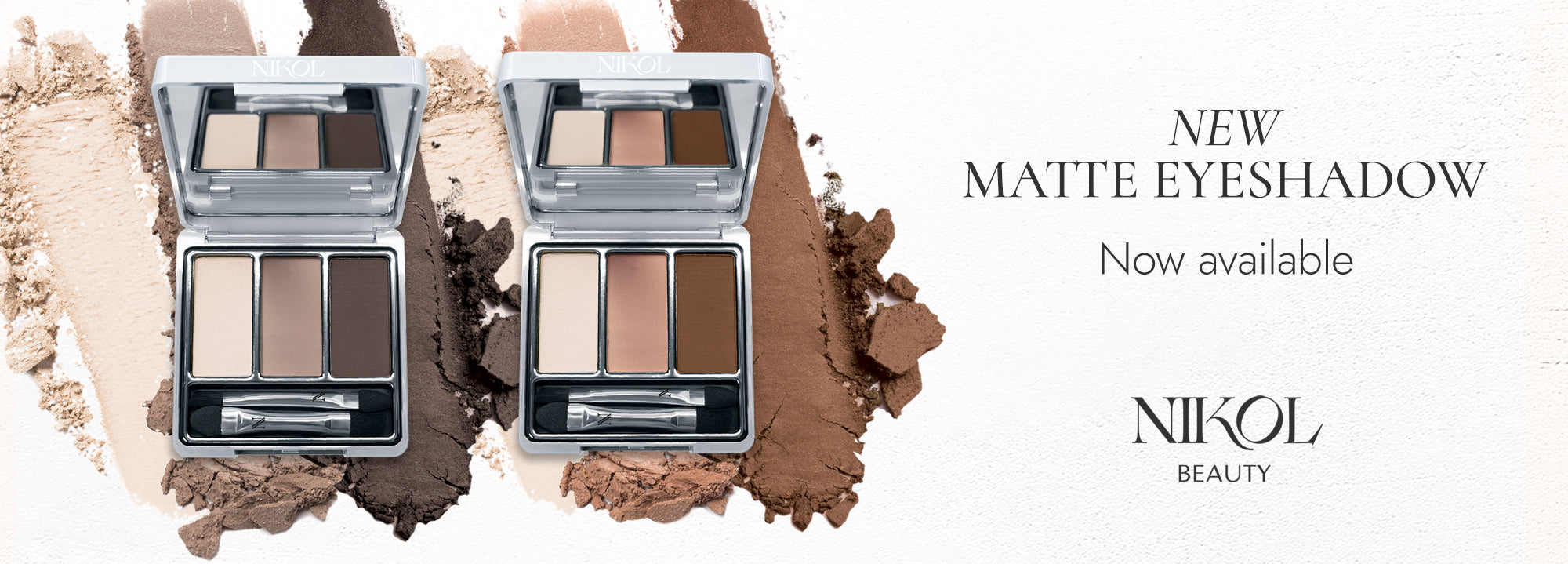 Two open matte eyeshadow palettes with neutral shades on a white background, each with three colors and a small brush, with text: NEW MATTE EYESHADOW Now available.