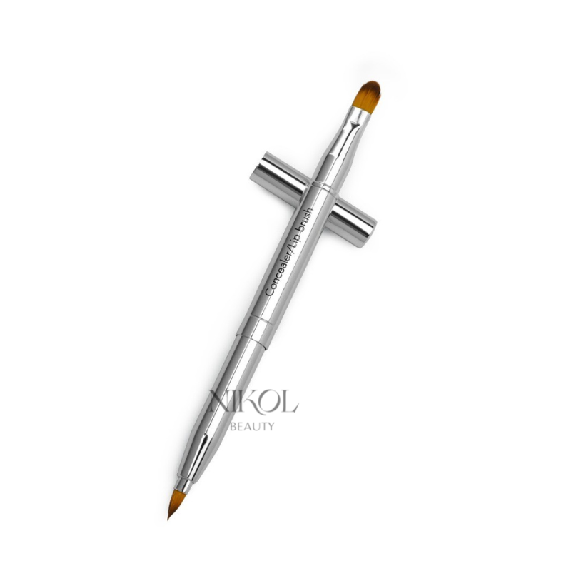 The Shopgalaxys Concealer/Lip Brush features an innovative dual-ended design with a sleek metallic handle. One end has a small pointed precision concealer brush, while the other has a larger rounded brush. The text Concealer Mixing Brush is visible on the handle.